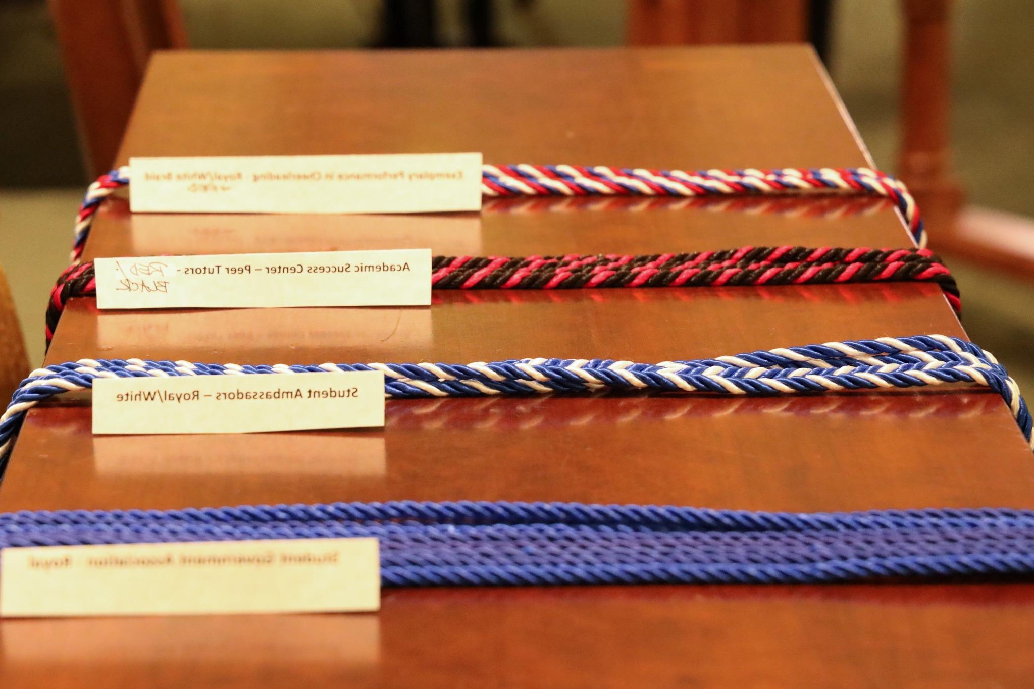 Cords laying on table during Baccalaureate.